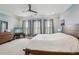 Spacious main bedroom features a ceiling fan and many windows letting in natural light at 190 Marion Ne Pl, Atlanta, GA 30307
