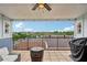 Outdoor living space boasts skyline views, covered seating area, and built in grill at 190 Marion Ne Pl, Atlanta, GA 30307