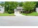Charming two-story home with a well-manicured lawn and two-car garage at 2263 Hill Creek Way, Marietta, GA 30062