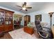 Comfortable living room featuring hardwood floors, built-in shelving, and lots of natural light at 2263 Hill Creek Way, Marietta, GA 30062