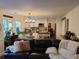 Spacious living room with a dining area and kitchen in the background at 2263 Hill Creek Way, Marietta, GA 30062