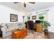 Cozy living room with comfortable seating, wood desk, and large window views at 2263 Hill Creek Way, Marietta, GA 30062
