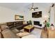 Comfortable living room with a fireplace and a large leather sectional couch at 2263 Hill Creek Way, Marietta, GA 30062