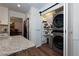 Well-organized pantry with sliding barn door and convenient laundry area at 2263 Hill Creek Way, Marietta, GA 30062