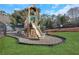 A full view of the neighborhood playground, with a slide and mulch at 2263 Hill Creek Way, Marietta, GA 30062