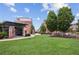 Community gathering area with manicured lawn, a gazebo, mailbox and inviting seating arrangements at 306 Masons Row, Marietta, GA 30060