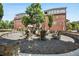 Community fire pit area with stone surround, offers a relaxing outdoor social space at 306 Masons Row, Marietta, GA 30060
