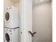 Efficient laundry area with stacked washer and dryer, maximizing space and convenience at 306 Masons Row, Marietta, GA 30060