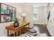 Well-lit home office with a wooden desk, modern decor, and hardwood floors at 306 Masons Row, Marietta, GA 30060