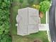 Overhead aerial shot of the house showing the roof, driveway, backyard, surrounding landscaping and neighborhood at 3157 Perimeter Cir, Buford, GA 30519