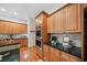 This kitchen showcases granite countertops, stainless steel double ovens, and ample cabinet space at 3157 Perimeter Cir, Buford, GA 30519
