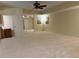 Expansive living room featuring neutral carpet and wall colors at 3157 Perimeter Cir, Buford, GA 30519