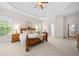Spacious main bedroom features a trey ceiling and lots of natural light at 3157 Perimeter Cir, Buford, GA 30519