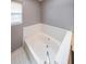 A close up of a bathtub at 4228 Lakes End Nw Dr, Kennesaw, GA 30144