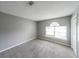 Neutral toned bedroom with carpet at 4228 Lakes End Nw Dr, Kennesaw, GA 30144