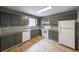 Well-maintained kitchen with granite countertops, ample cabinetry, and modern appliances at 4228 Lakes End Nw Dr, Kennesaw, GA 30144