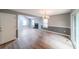 Spacious living room with modern flooring, fireplace, and plenty of natural light at 4228 Lakes End Nw Dr, Kennesaw, GA 30144