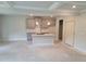 Open kitchen area featuring an island and modern finishes at 45 Avian Way, Auburn, GA 30011