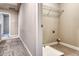 Hallway view into laundry room with shelving and durable vinyl flooring at 45 Avian Way, Auburn, GA 30011