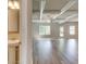 Bright living room featuring wood floors and coffered ceilings at 45 Avian Way, Auburn, GA 30011