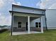 Covered patio offers a relaxing outdoor living space at 45 Avian Way, Auburn, GA 30011
