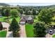 An aerial view of a home nestled amongst the trees in a tranquil and private residential area at 16 Kentucky Ne Walk, Cartersville, GA 30121