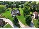 Wide aerial shot of a single-Gathering home, highlighting its sprawling lawn and neighborhood at 16 Kentucky Ne Walk, Cartersville, GA 30121