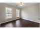 Comfortable bedroom with ceiling fan and a large window with backyard views at 16 Kentucky Ne Walk, Cartersville, GA 30121
