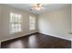 Bedroom showcasing a ceiling fan, neutral walls, and natural lighting at 16 Kentucky Ne Walk, Cartersville, GA 30121