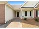 Covered front porch with brick and siding details, providing a welcoming entrance to the home at 16 Kentucky Ne Walk, Cartersville, GA 30121