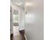 Hallway featuring dark wood floors and a view into the next room at 16 Kentucky Ne Walk, Cartersville, GA 30121