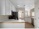 Well-lit kitchen boasts ample cabinet space and stainless steel appliances at 16 Kentucky Ne Walk, Cartersville, GA 30121