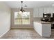 Cozy breakfast area featuring bright windows and convenient access to kitchen appliances at 16 Kentucky Ne Walk, Cartersville, GA 30121