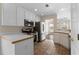 Modern kitchen with stainless steel appliances, white cabinets, and stylish countertops at 16 Kentucky Ne Walk, Cartersville, GA 30121