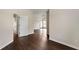 Open-concept living area with hardwood floors, a ceiling fan, and plenty of natural light at 16 Kentucky Ne Walk, Cartersville, GA 30121