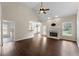 Spacious living room features hardwood floors, fireplace, and access to the kitchen at 16 Kentucky Ne Walk, Cartersville, GA 30121