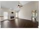 The living room features high vaulted ceiling, hardwood floors and a fireplace at 16 Kentucky Ne Walk, Cartersville, GA 30121