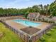 Aerial view of a community pool, tennis courts, landscaping, and gazebo at 1355 Pinebreeze Way, Marietta, GA 30062