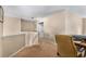 Bright landing area with carpet, featuring a railing and an office desk area at 1355 Pinebreeze Way, Marietta, GA 30062