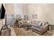 Bright living room showcasing fireplace, built-in shelving, and large sectional sofa at 1355 Pinebreeze Way, Marietta, GA 30062