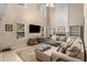 Spacious living room with vaulted ceilings, built-in shelves, and a cozy fireplace at 1355 Pinebreeze Way, Marietta, GA 30062