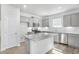 New kitchen featuring granite countertops, stainless steel appliances and light gray cabinetry at 189 Park Ln, Fairburn, GA 30213