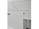 Functional laundry area with wire shelving and utility connections at 189 Park Ln, Fairburn, GA 30213