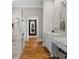 Modern bathroom boasts a walk-in shower, sleek fixtures, and updated vanity at 193 Stonegate Trl, Carrollton, GA 30116