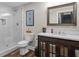 Finished basement bathroom offers shower, vanity with undermount sink, and modern fixtures at 193 Stonegate Trl, Carrollton, GA 30116