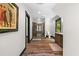 Hallway view of the spacious bath area showcasing a glass shower and wooden cabinets at 193 Stonegate Trl, Carrollton, GA 30116