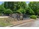 Stone monument with landscaping welcomes you into this lovely neighborhood at 193 Stonegate Trl, Carrollton, GA 30116