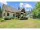 Backyard patio with outdoor seating, and a beautiful view of the property at 193 Stonegate Trl, Carrollton, GA 30116