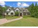 Charming two-story home with a welcoming front porch and meticulous landscaping creates an inviting curb appeal at 193 Stonegate Trl, Carrollton, GA 30116