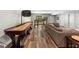 Recreational room with a shuffleboard table, sofa, and side tables at 193 Stonegate Trl, Carrollton, GA 30116